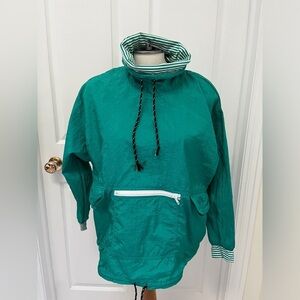 I. p. connection pullover windbreaker/rain jacket with cowl neck.
